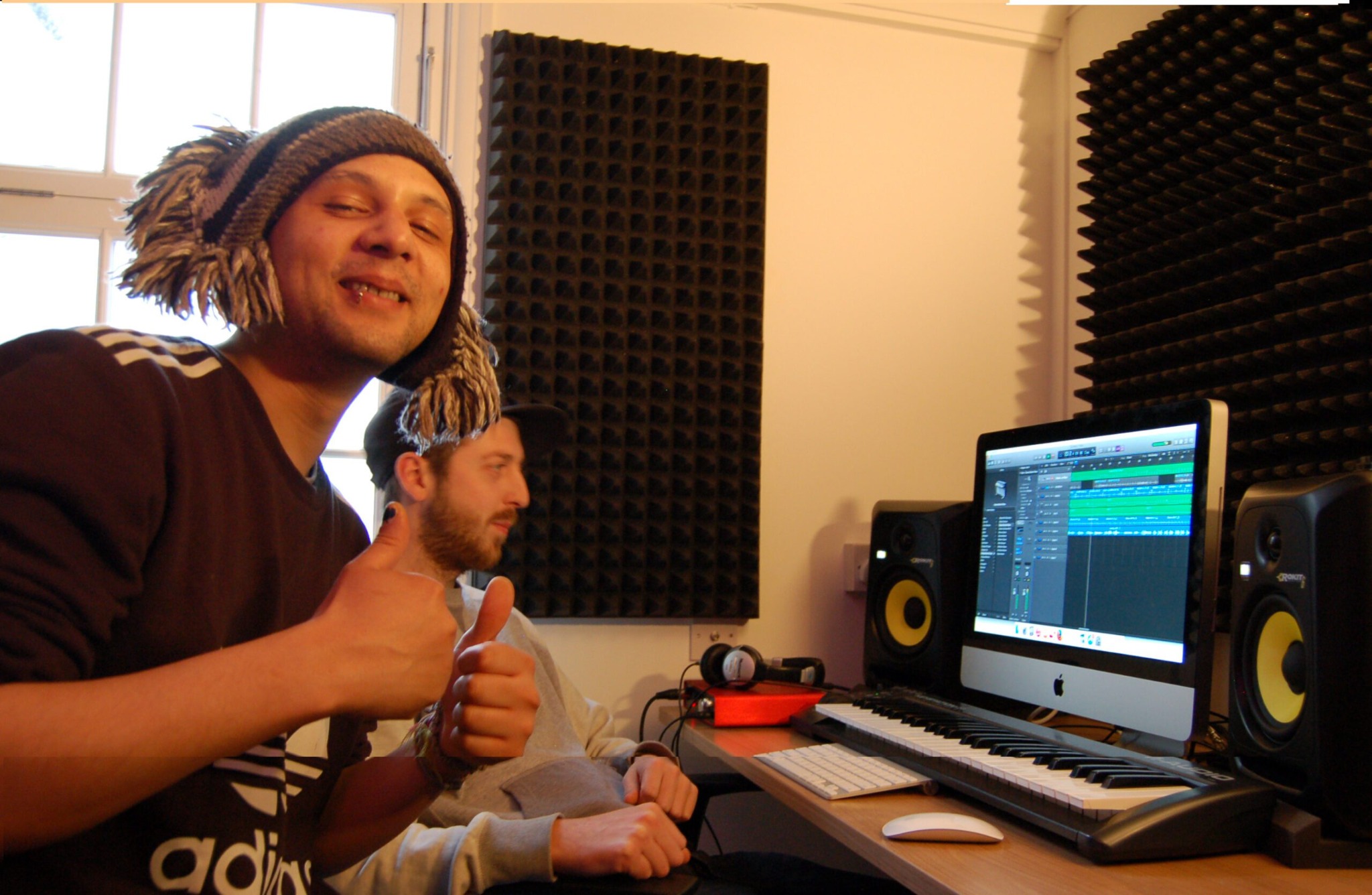 A Key Changes artist and mentor working together in a recording studio